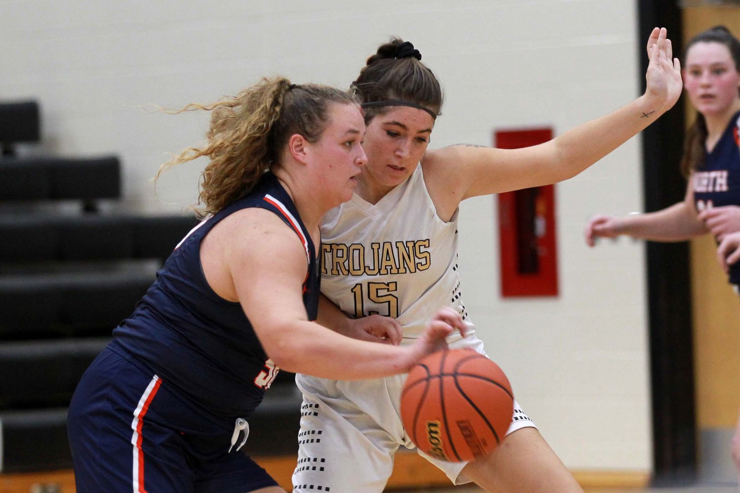 Piper Ramey of North Montgomery tries to drive past Shiann Haymaker of Covington in the third quarter.